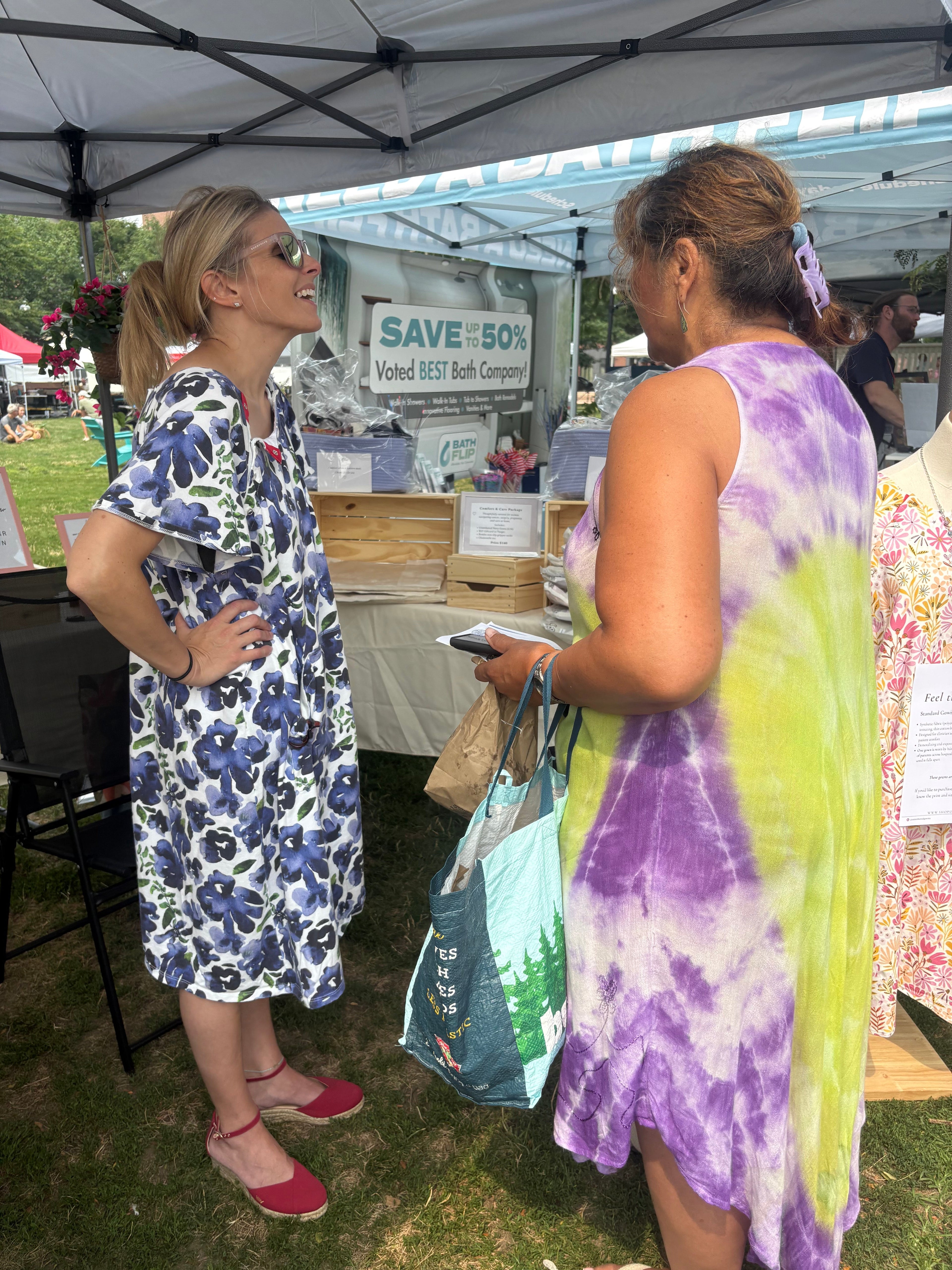 Woman showing organic recovery gowns made for women with chronic illness 