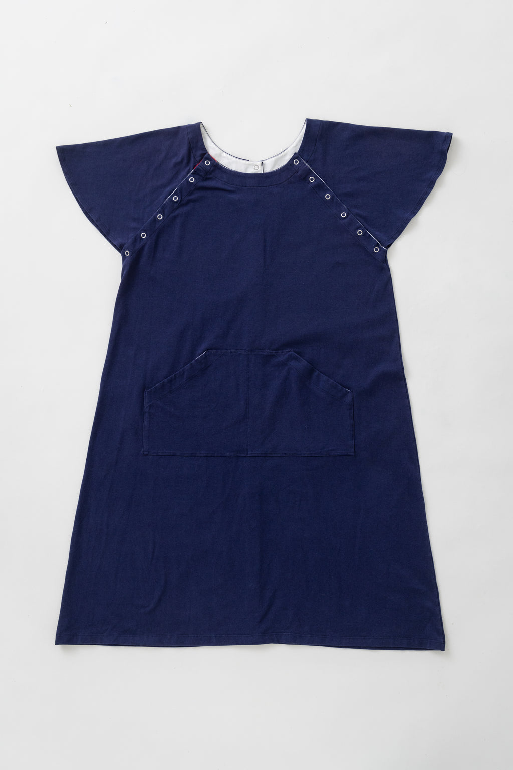 Flat lay of frontside of blue hospital gown for women