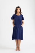 Luxury Women’s Hospital Gown (Navy) showing front snaps and pockets